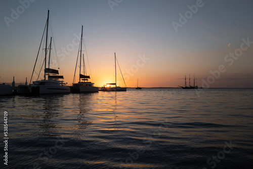 sunset on the sea yacht in harbour at sunset calm peaceful 