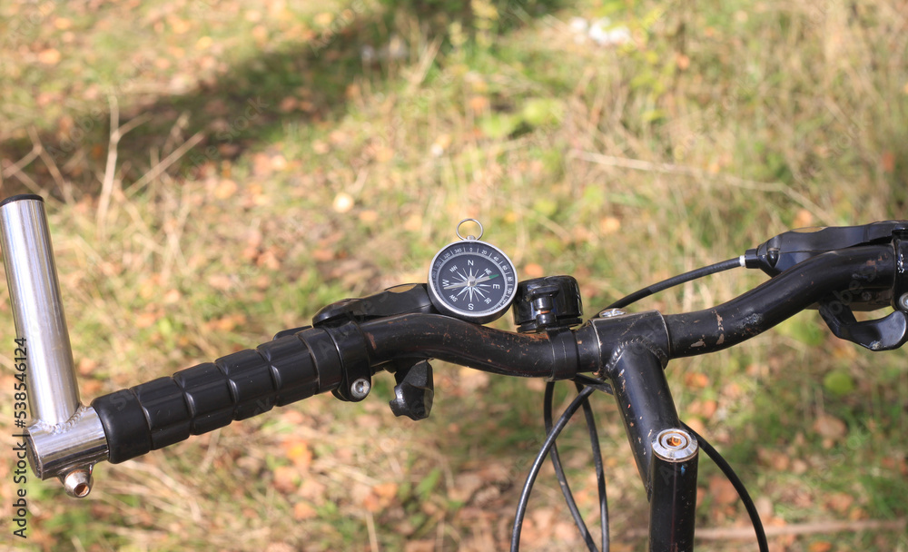 round compass on bicycle wheel round compass on bicycle wheel
