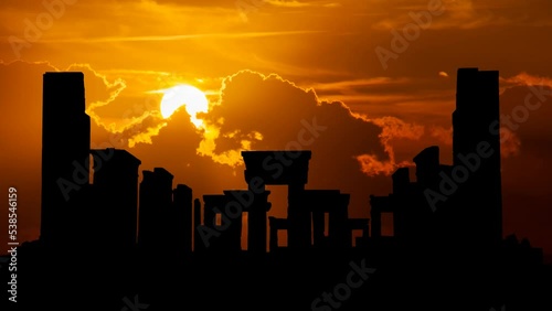 Persia: Ruins of Tachara, the Palace of Darius the Great in Persepolis, Time Lapse at Sunset with Red Sun and Fiery Sky, Unesco Site in Iran