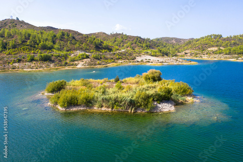 Aerial view of Gadouras Dam. Solving the important and crucial water supply problems. Near the villages of Lardos and Laerma in the southern part of the island. Rhodes, Greece.