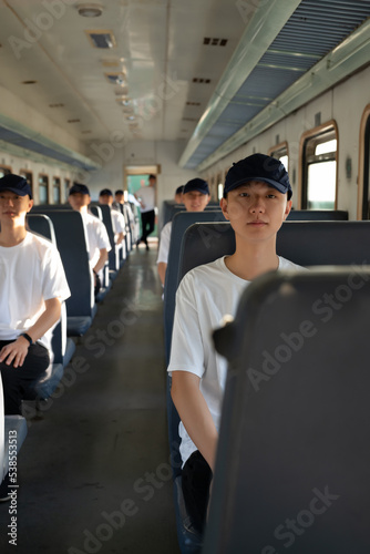 Canvas Print multiple clones of the same person in a train. Concept of clone.