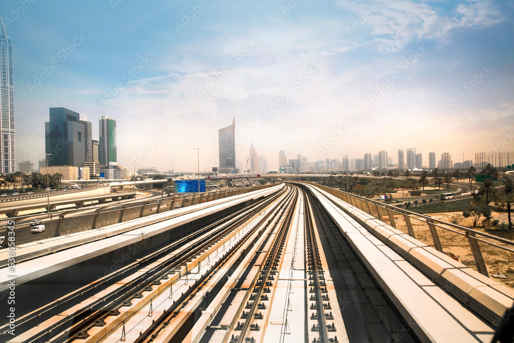 Dubai, UAE. Train, tube track with City view at the distance
