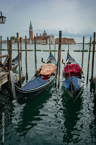 2 gondolas in Venice, cloudy weather