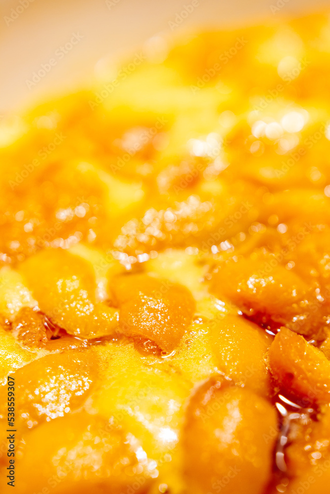 Apricots are cooked in a pan. Apricot jam. Pieces of fruit. Home preservation. Apricots are cooked in a pan. Apricot jam. Pieces of fruit. Home preservation.