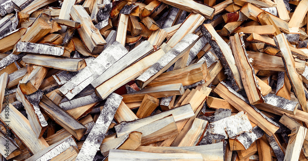 Pile of chopped firewood of Birch background Pile of chopped firewood of Birch background