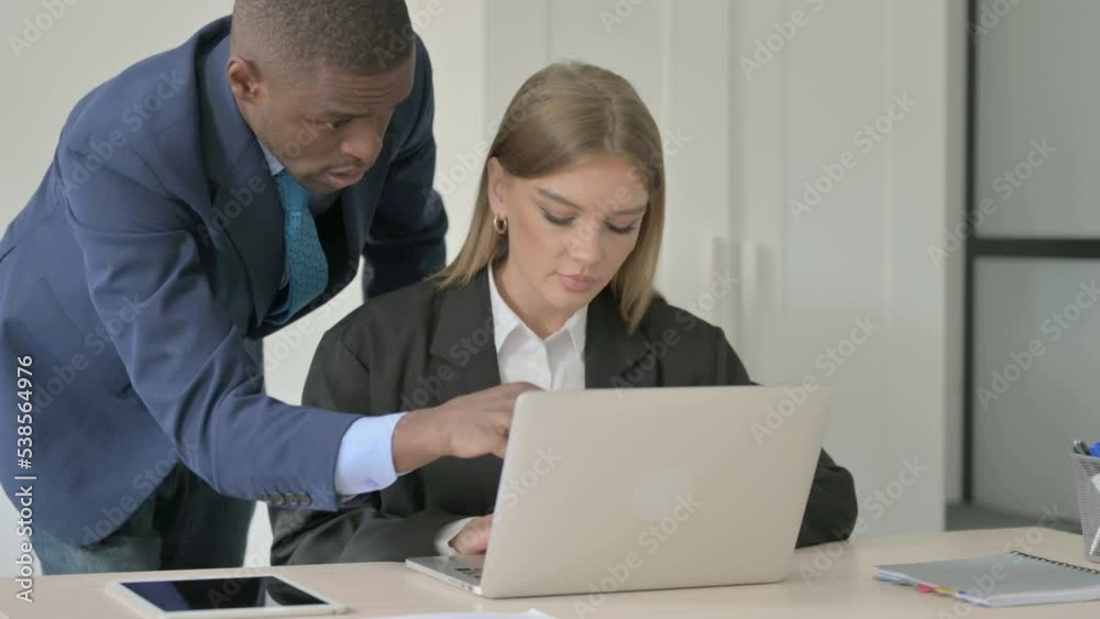 Standing African Businessman Helping Female Employee at Work, Guiding Standing African Businessman Helping Female Employee at Work, Guiding
