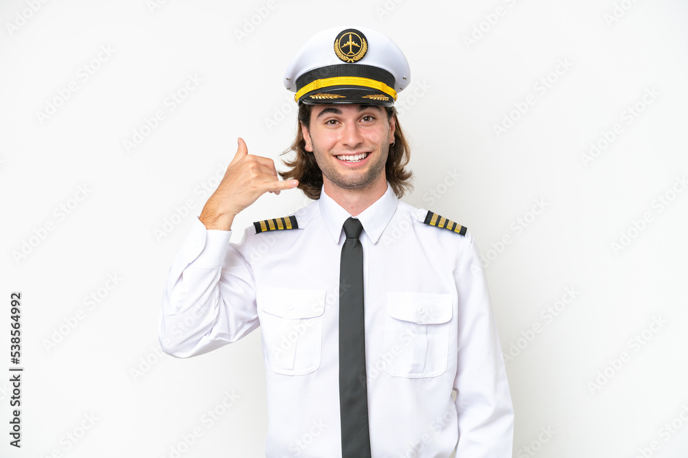 handsome Airplane pilot isolated on white background making phone gesture. Call me back sign handsome Airplane pilot isolated on white background making phone gesture. Call me back sign