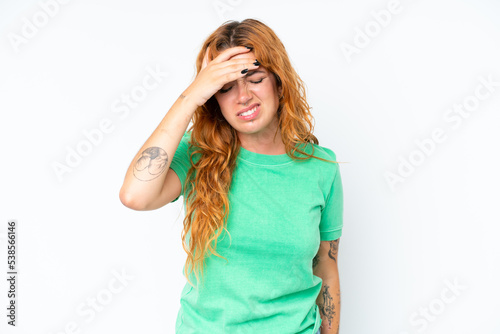 Young caucasian woman isolated on white background with headache