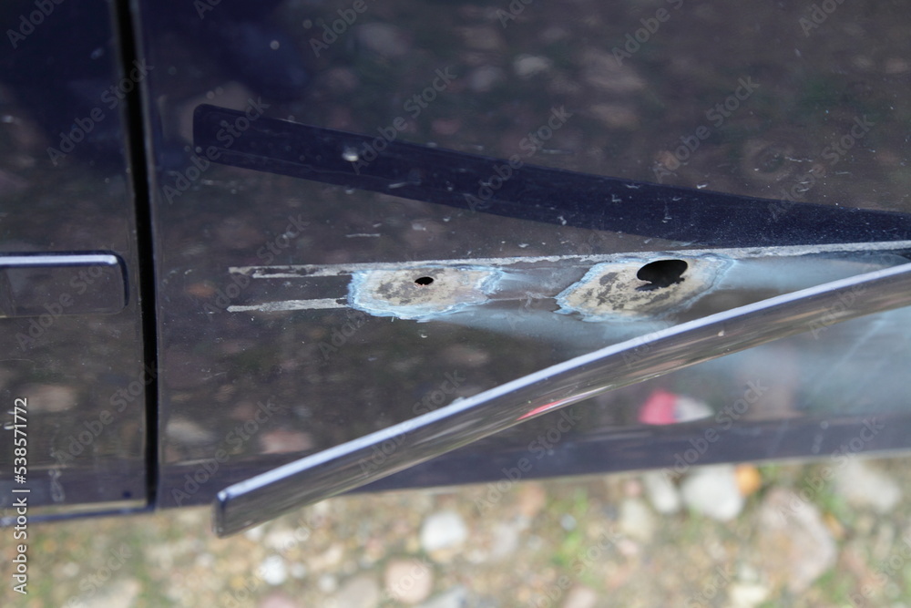 Car grinded door corrosion under molding .