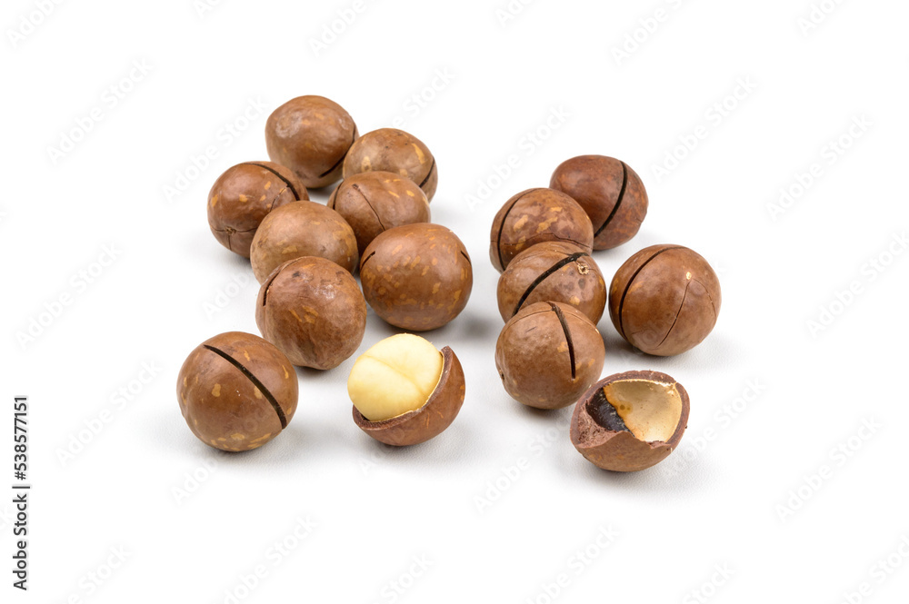 a handful of macadamia nuts on white background isolate a handful of macadamia nuts on white background isolate