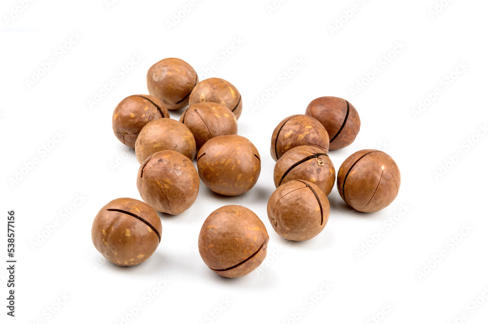 a handful of macadamia nuts on white background isolate a handful of macadamia nuts on white background isolate