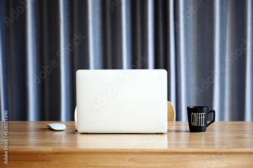 laptop on desk at home small business © kathayut