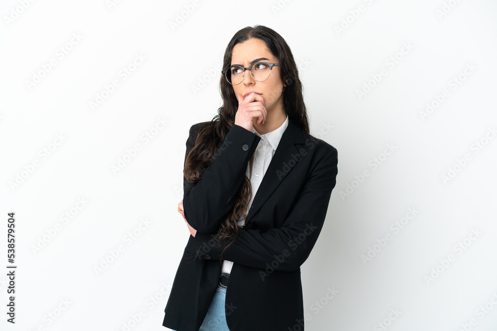 Young business woman isolated on white background having doubts Young business woman isolated on white background having doubts