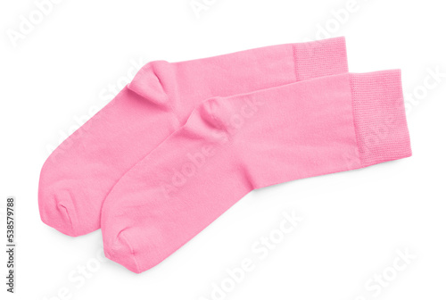 Pair of pink socks on white background, top view