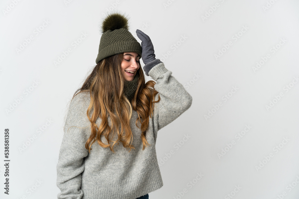 Young caucasian woman with winter hat isolated on white background has realized something and intending the solution Young caucasian woman with winter hat isolated on white background has realized something and intending the solution