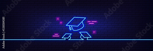 Neon light glow effect. Graduation caps line icon. Education sign. Student hat symbol. 3d line neon glow icon. Brick wall banner. Throw hats outline. Vector
