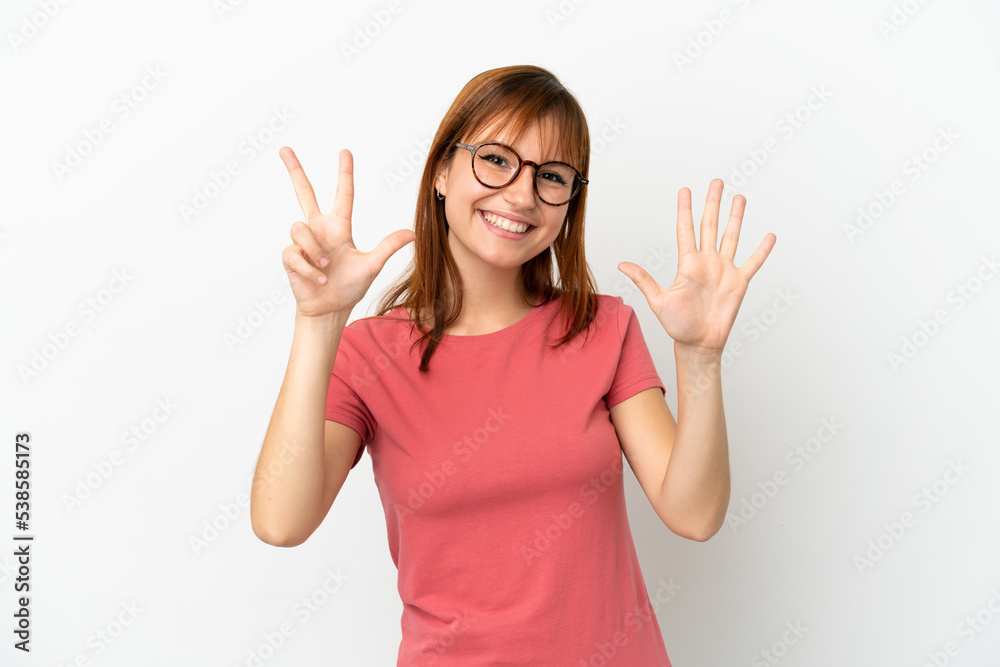 Redhead girl isolated on white background counting eight with fingers Redhead girl isolated on white background counting eight with fingers