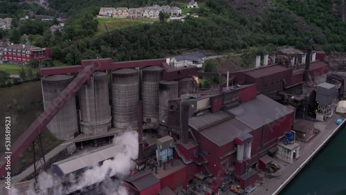 modern safe chemical production plant on the shore of the fjord, aerial view photo