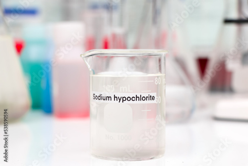 Sodium hypochlorite in glass, chemical in the laboratory and industry photo