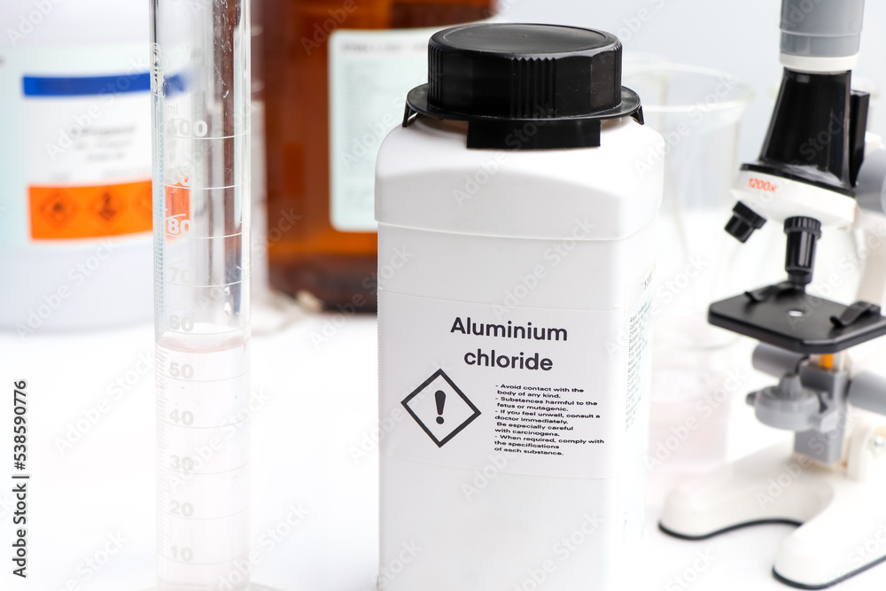 Aluminium chloride in bottle, chemical in the laboratory and industry