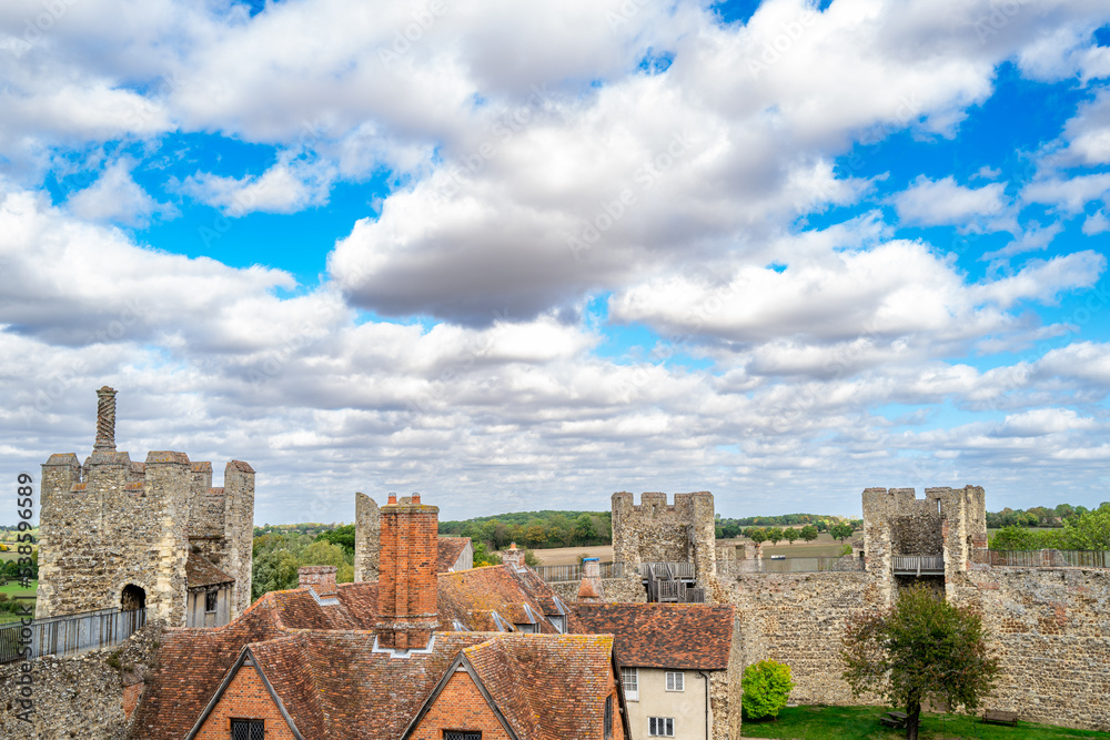 High level view of the towers of a medieval English castle under summer ...