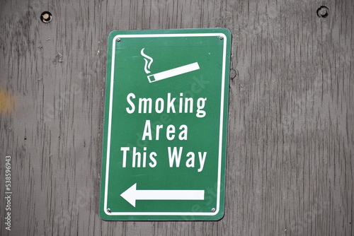 smoking permitted area directional sign
