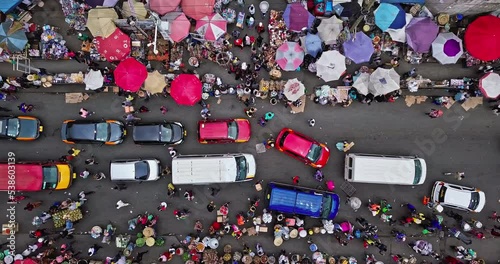 Crowd of people and cars at Accra Central Market