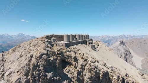 aerial scenic view of ruined artillery batteries with people (515a Batteria Guardia alla Frontiera), Mont Chaberton peak photo