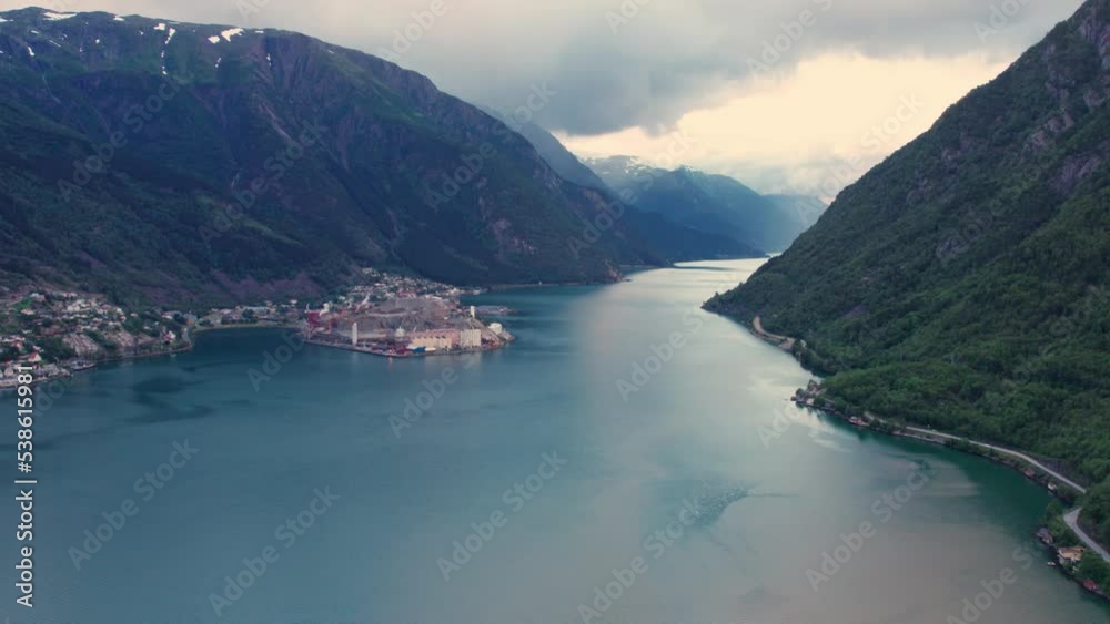 view of the fjords from the air, the reflection of the mountains and the sky in the lake view of the fjords from the air, the reflection of the mountains and the sky in the lake