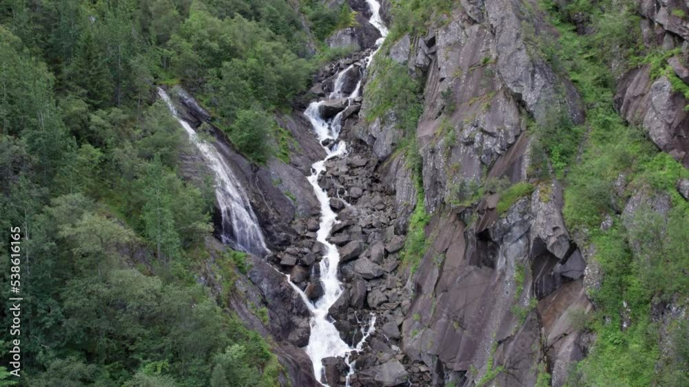 picturesque waterfall, many cascades, Norwegian mountains aerial view picturesque waterfall, many cascades, Norwegian mountains aerial view