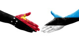 Handshake between Estonia and Papua New Guinea flags painted on hands, isolated transparent image.