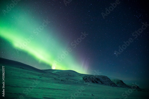 Northern lights in Reinheim Cabin, Dovrefjell National Park, Norway © Alberto Gonzalez 