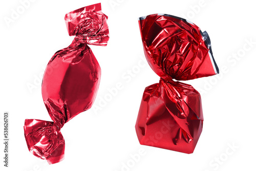 Foto Two red wrapped candy isolated on a white background
