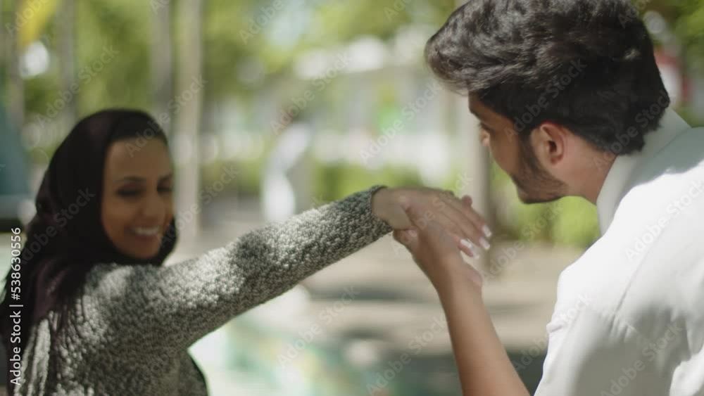 Vid o Stock Close up Of Muslim Man Kissing His Womans Hand Outdoors vid-o-stock-close-up-of-muslim-man-kissing-his-womans-hand-outdoors