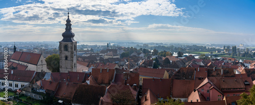 cityscape panorama of the rooftops and streets of Ptuj as seen from the Ptuj Castle hilltop photo