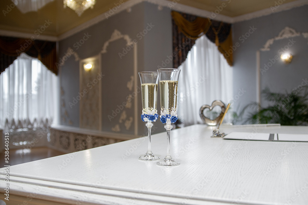 wedding glasses in the registry office on the table with champagne wedding glasses in the registry office on the table with champagne