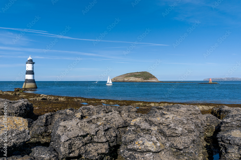 view of the Penmon Lighthouse and Puffin Island in North Wales
