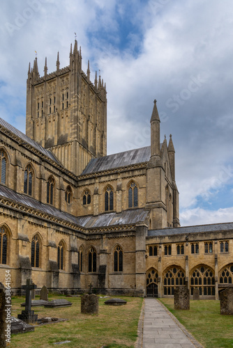 view of the cloister and cemetery of the 12th-centruy Gothic Wells Cathedral in Somerset