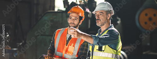 industrial factory with men...