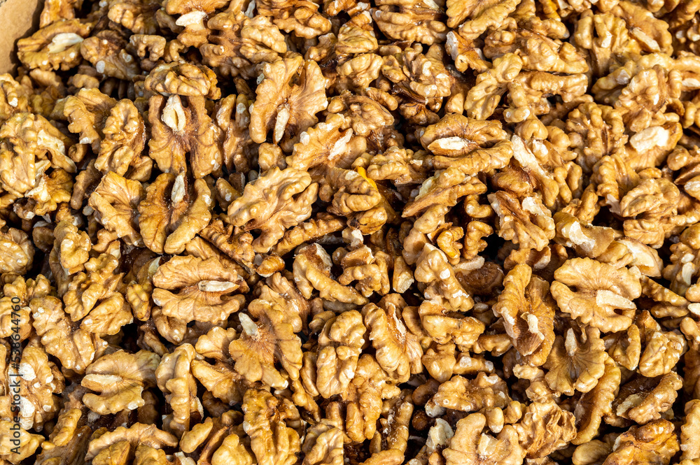 Peeled walnut kernels background