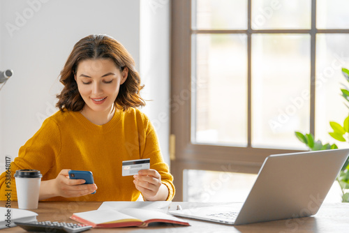 Woman is doing online purchases