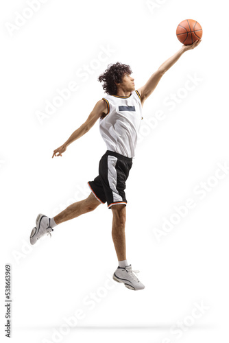 Full length shot of a basketball player performing a layup © Ljupco Smokovski