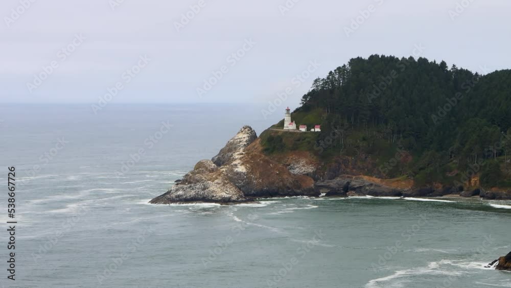 Scenic view of Heceta Head Lighthouse on the coastline of Oregon by historic route 101 Scenic view of Heceta Head Lighthouse on the coastline of Oregon by historic route 101