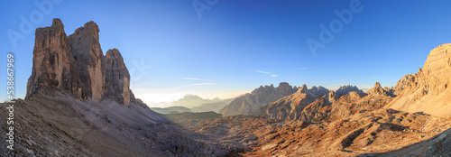 Panoramic view of Tre Cime Lavaredo and Torre dei Scarperi mountains before sunset