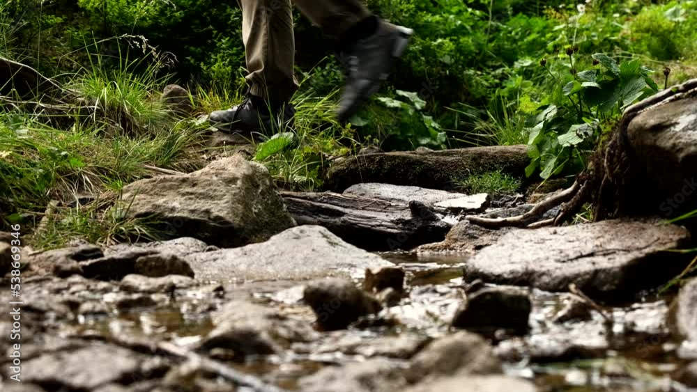 man legs crop video crossing mountains creek man legs crop video crossing mountains creek