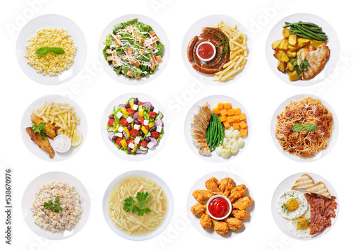 Plates of food isolated on a white background, top view