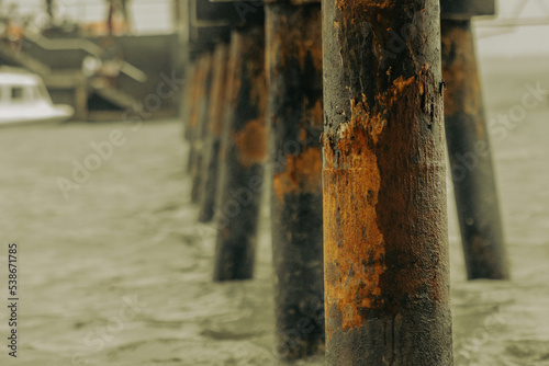 An Old Pier Rotting by the Seawater.