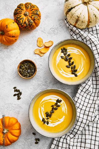Homemade autumn squash soup with pumpkin seeds