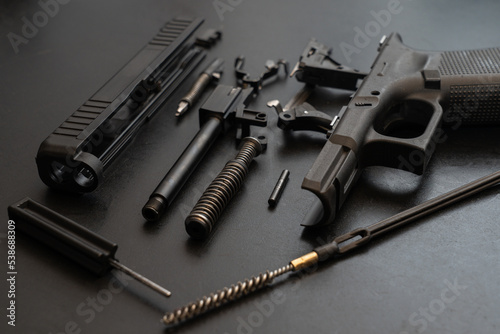 Disassembled for cleaning gun close-up.