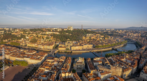 The drone panoramic view of The Basilica of Notre-Dame de Fourvière, Saone River and downtown district of Lyon, France. 